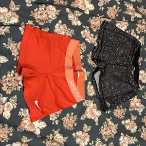 Nike (Red) and Adidas (black) spandex size M